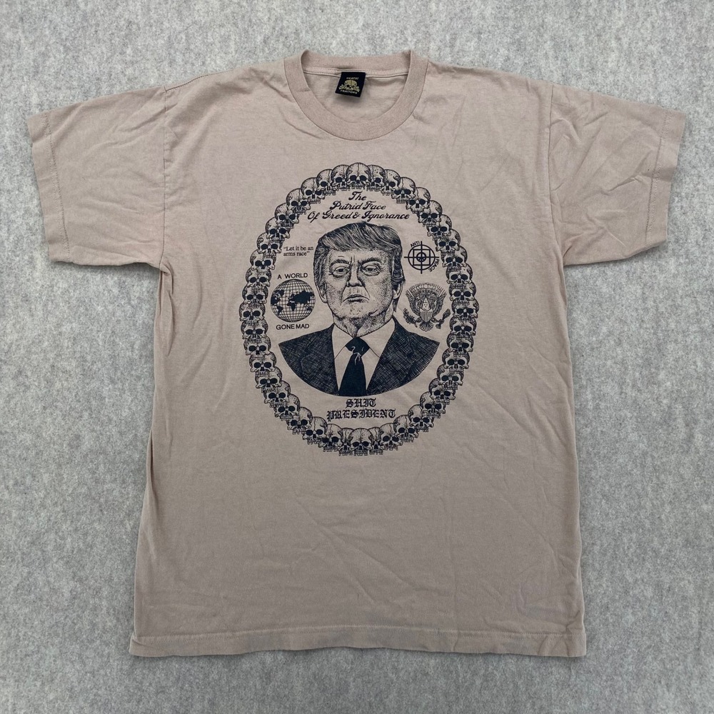 Death Traitors Donald Trump Putrid Face of Greed Skulls Graphic T-Shirt Tan L